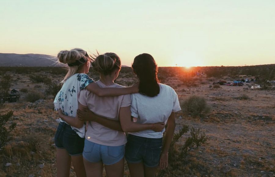 Freshman girls enjoying the beautiful sunset with their classmates in Barstow, California. Graphic courtesy of Faith Ferry 
(21)