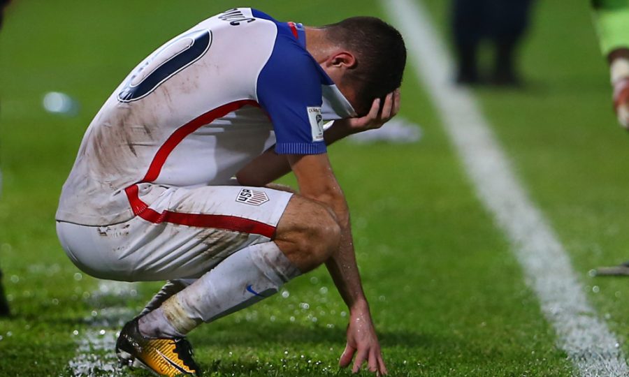 Historic Disappointment: USMNT rising star, Christian Pulisic, displays his disgust as the US misses out on the 2018 World Cup. Graphic courtesy of Getty Images 