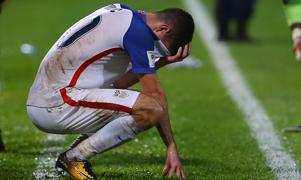 Historic Disappointment: USMNT rising star, Christian Pulisic, displays his disgust as the US misses out on the 2018 World Cup. Graphic courtesy of Getty Images