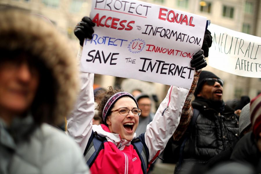 Protesters protesting against the FCC’s ruling.