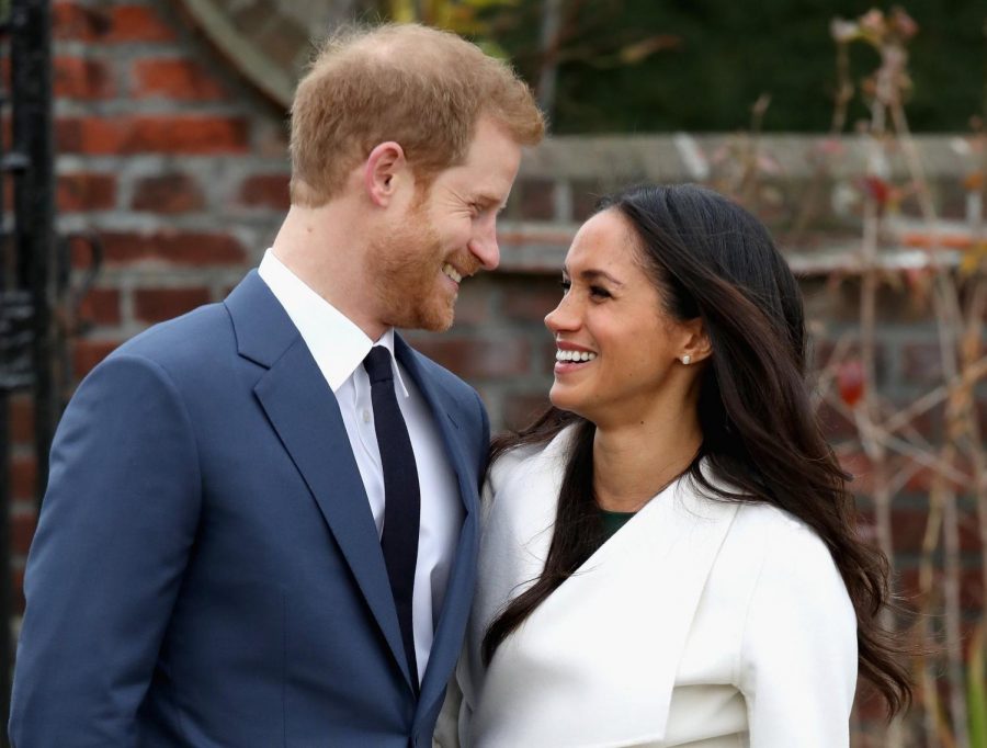 Meghan Markle and Prince Henry gaze into each others’ eyes as their engagement is announced.