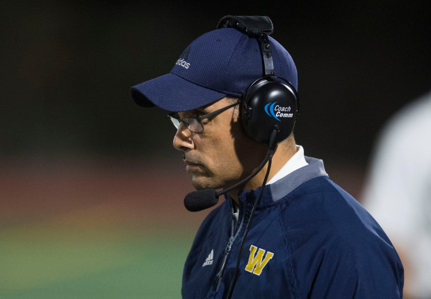 Head Coach of the Webb Gauls, Amahl Thomas, watches the game from the sidelines. Graphic Courtesy of Kevin Sullivan, Orange County Register/SCNG. 