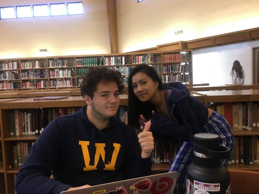 Catherine Wu (19) and Ben Martinez (19) are all smiles as they have been friends for the past four years in the same class. 