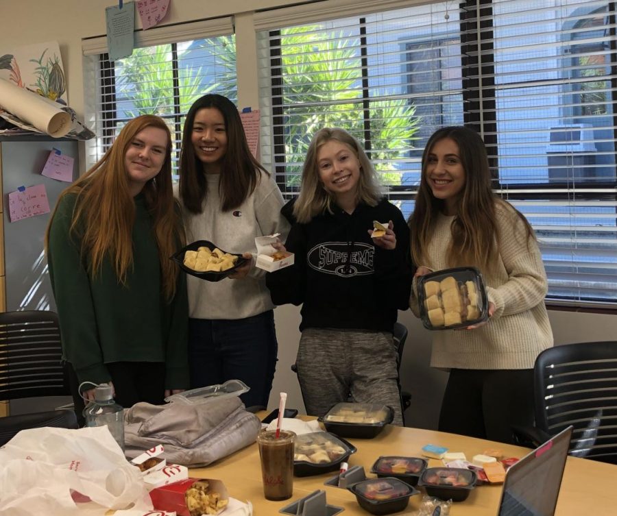 An advisory full of seniors dine on Chik-fil-a. 