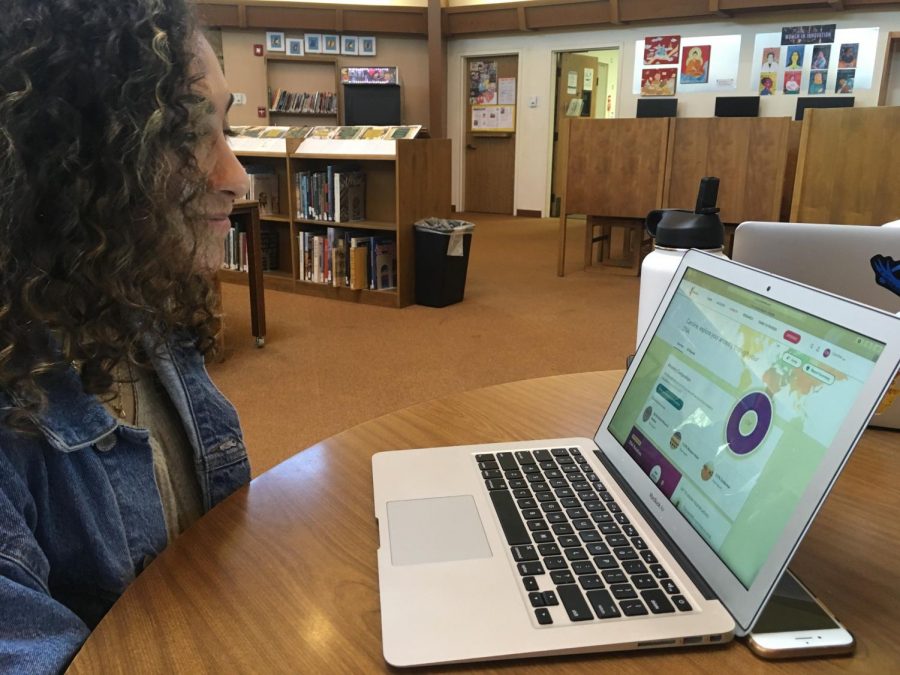 Caroline Metyas (‘20) views her ancestry results on the genealogy website, 23andMe. If sites like this allowed the FBI to access their databases, hundreds of cold cases could be solved. 