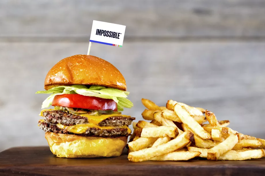 The Impossible Burger with a side of fries looking like a real burger. Image courtesy of Eater Houston.
