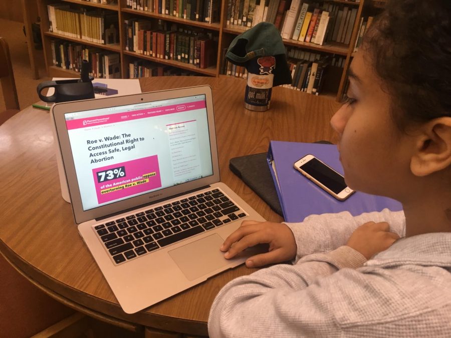 Caroline Metyas (‘20) looks up Roe v. Wade statistics on the Planned Parenthood website. 73% of Americans oppose the overturning of Roe v. Wade, yet with the introduction and approval of recent fetal heartbeat bills in Georgia, Alabama, and Missouri, the Roe v. Wade decision may soon be rechallenged in the Supreme Court. 