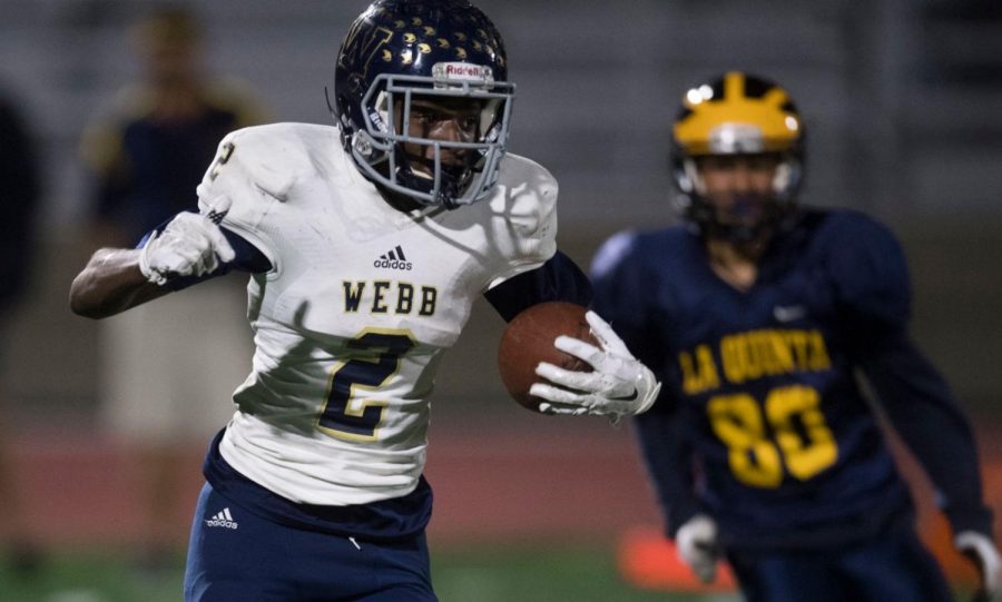 Nick Johnson (19) breaks tackle during his high school football game. Graphic Courtesy of MediaNews Group/Orange County Register via Getty Images.