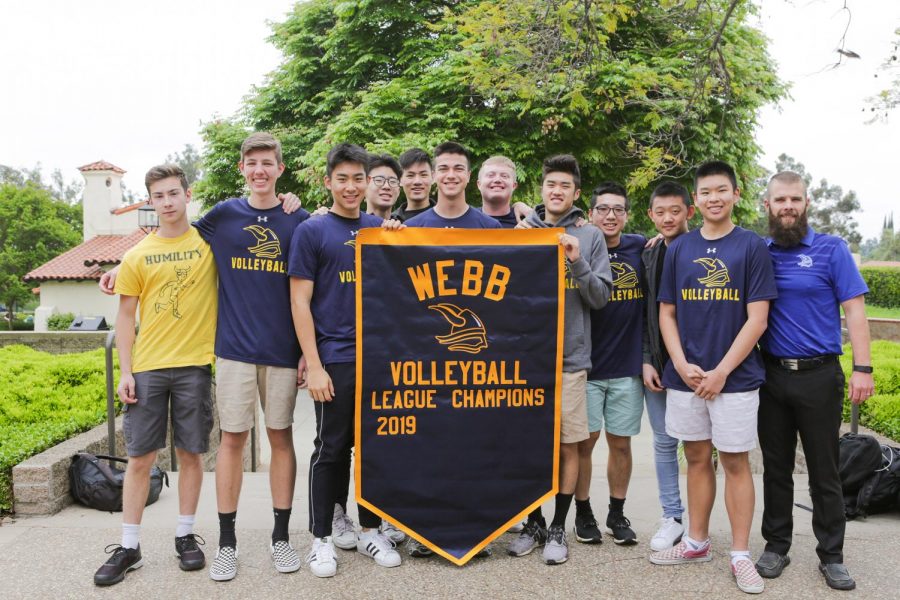 The WSC volleyball team receives their CIF league championship banner. 