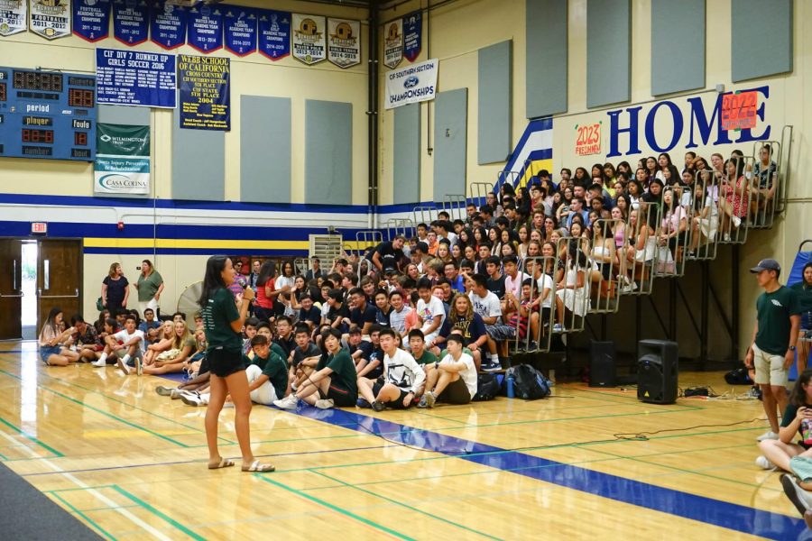 Sydney Wuu (‘20), VWS All-School President, introduces the activities to students and faculty while the underclassmen wait excitedly for the games.
