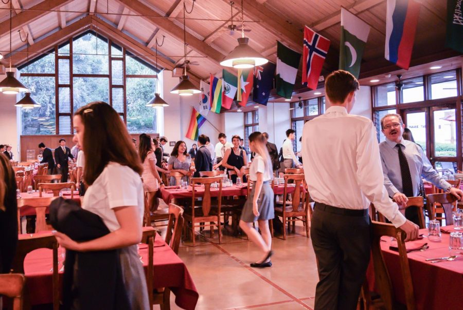 After Sunday chapel service, Webb students bustle into the dining hall and toward their community dinner tables. 