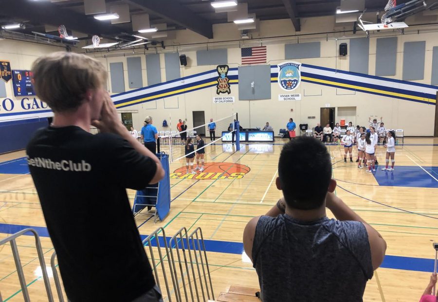 Cayden Lazier (‘20) and Stephen Li (‘21) cheer on the VWS varsity volleyball team at their league championship game.
