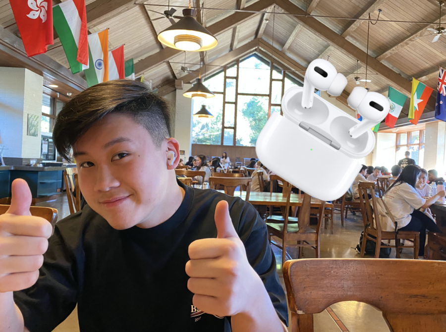 Linh Nguyen (20) gives his new Airpods Pro a thumbs up.