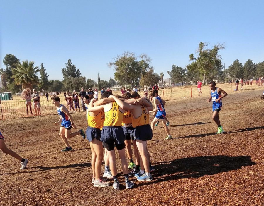 Runners cuddle before racing. 