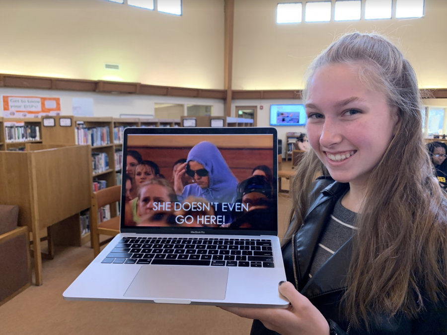 Ashley Cox (‘21) poses with the meme she wore on meme day. 