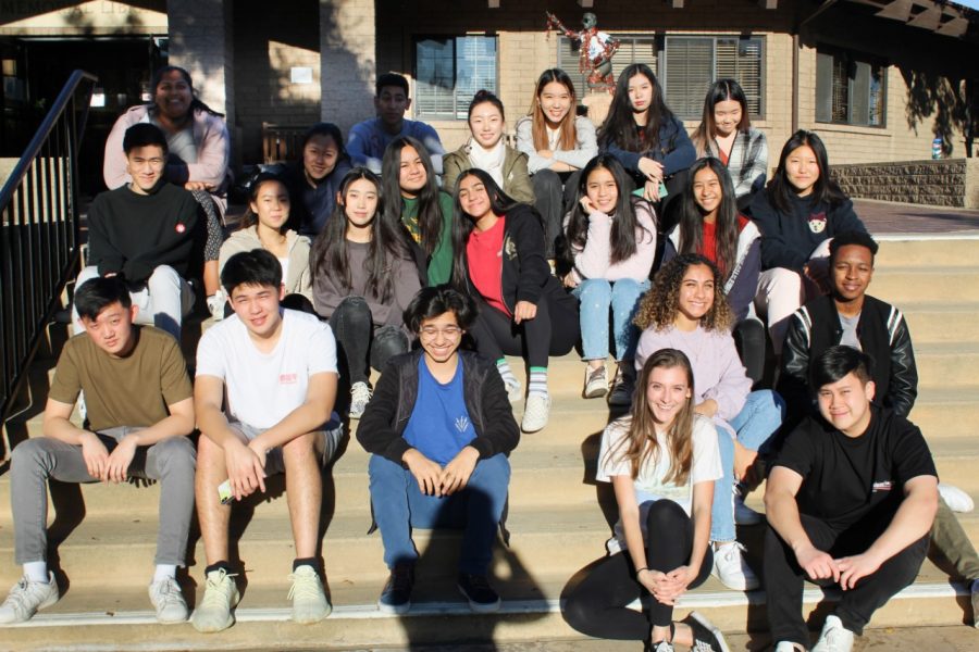 The yearbook staff poses outside of Fawcett Library.