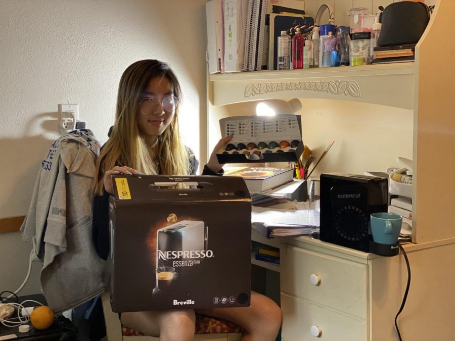 Elizabeth Wang (‘21) poses with her brand-new Nespresso Essenza Mini coffee machine in her North Hutch dorm room.