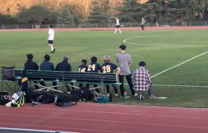 Jimmy McCloud (‘22) sits out for a home soccer game.
