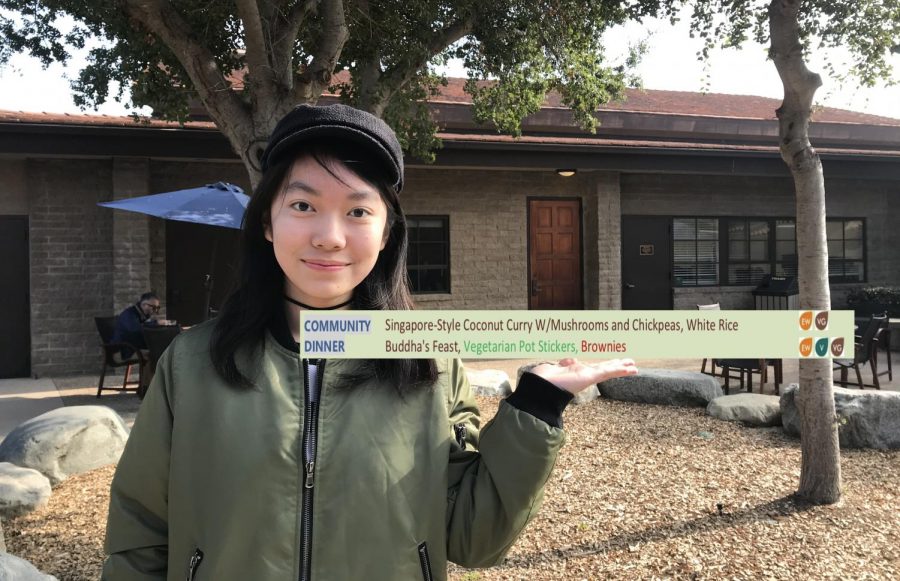 Shuci Zhang (‘23) stands with the vegan dinner menu she inspired.