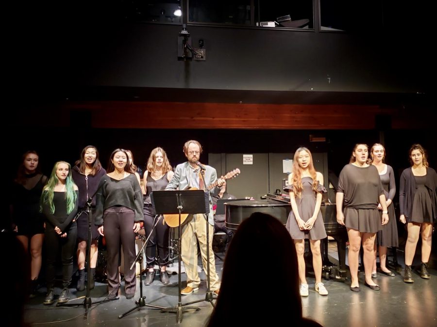 The chamber singers kick off the night with “Cherry Wine,” led by Sean Burns, fine arts department faculty.
