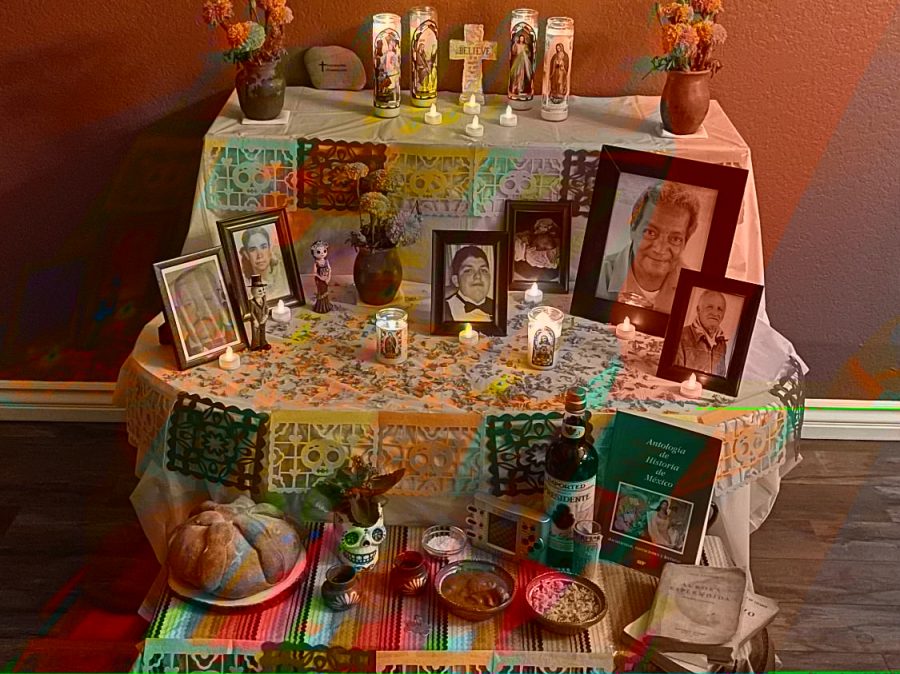Valeria Gonzalez (‘23) celebrates Día de los Muertos with her colorful “ofrenda,”altar in Spanish. 