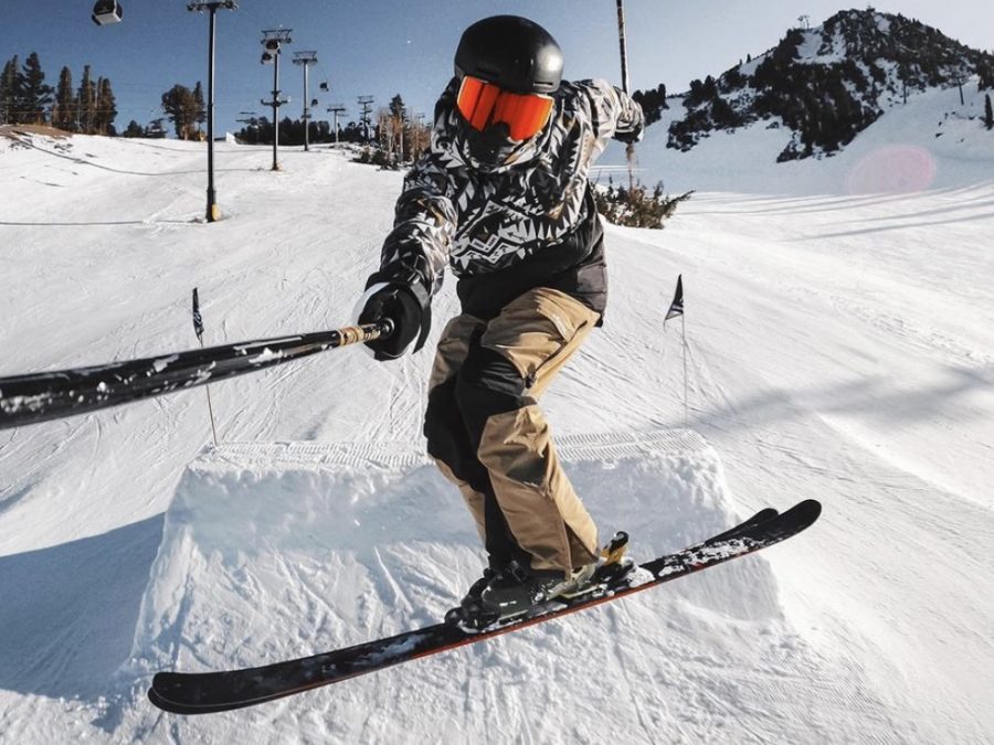 Snowboarder rides down Mammoth Mountain under COVID guidelines .