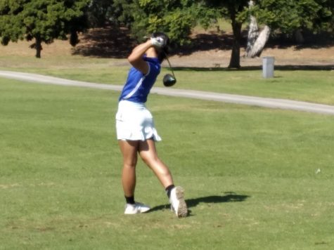 Angie Zhang (‘23) takes a swing during a recent game.