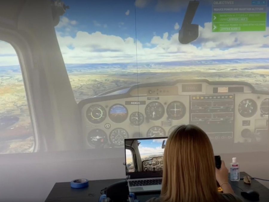 Emily Thornton (‘25) goes through the flight simulation set up in the Old School House, where she learns the basic handlings of a plane, including take off, landing, and trimming. Students in “Just Plane Fun” participate in flight simulations every morning of their unbounded. 