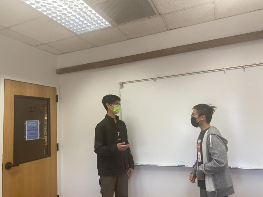 Sebastian Hofmann (‘23) and Conrad Poon (‘23) discuss films and history. “Historical movies have to embellish some details for entertainment, so that does change the perspective of how people know about the topic.” Conrad said. 