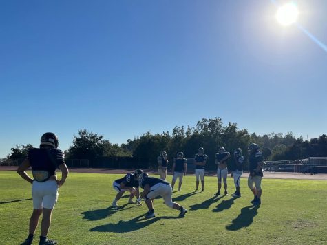 The Webb football team practices in heavy helmets and shoulder pads despite temperatures exceeding one hundred degrees. The scorching heat beats down on the players causing them to feel more fatigued during drills. “We had to persevere through the heat despite how our bodies felt,” said Jordan McCray (‘24), a football player. “I saw a couple of my teammates throwing up, it was so bad.” 