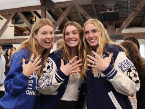 Caroline Metz (‘22), Taren Duffy (‘22) and Abbey Cook (‘23) happily model their team rings. The three girls were the starting forwards on the Vivian Webb soccer team during the ‘21-’22 season. The two alums continue to cheer on the team even when at college.