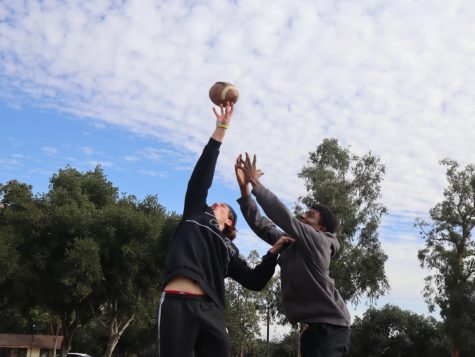 Ethan Undello (‘25) and Jordan McCray (‘24) play football together on Centennial Field in their off-season as Troy Seanoa (‘24) throws them a ball. They play together after spending their lunch talking about the recent NFL games that have been happening leading up to the Superbowl.  