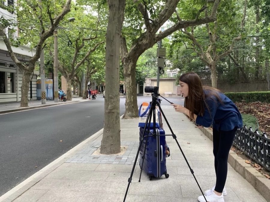 Jasmine Wan (‘23) stands behind a camera as she works on a project during distance learning. Since her sophomore year, Jasmine has been passionate about the art of filmmaking. 