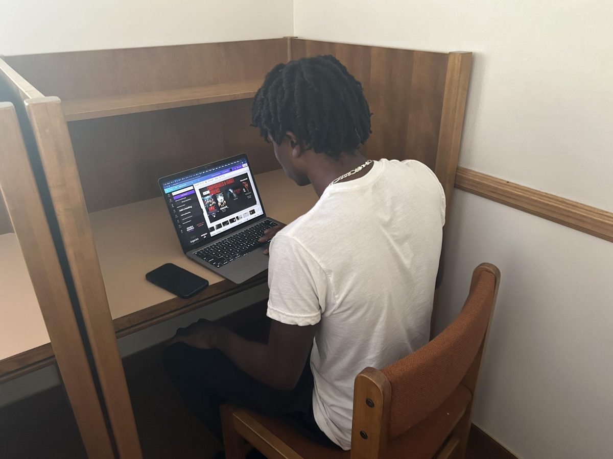 Jordan McCray (‘24) spends lunch completing homework assignments to save himself from being overwhelmed with hours of homework after he finishes practice. 