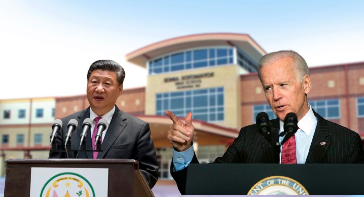 Xi Jinping, pictured left, and Joe Biden, pictured right, engage in negotiation over educational issues in front of a school. This debate represents the tension between the United States and China, which has largely affected education. “As an international student here, I need to juggle between my identity as a Chinese person and also this questionable relationship between US and China,” Joy Li (‘24) said. The fight between the two superpowers has impacted the daily lives of students. 