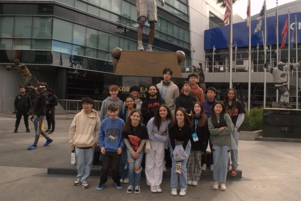 Students who attended the History of LA through Sports unbounded trip pose together in front of a memorial statue of Kobe Bryant at SoFi Stadium. Webbies were able to celebrate his legacy and learn more about his impact on the history of sports.  