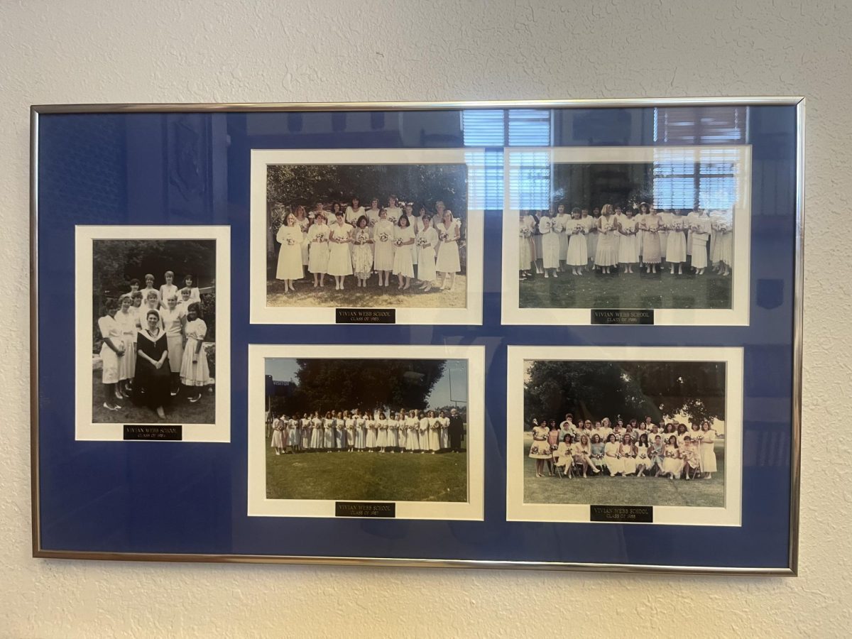 Above are framed graduation photos of the first five VWS classes, located in Jackson Library.