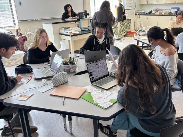 In Advanced Studies Anatomy & Physiology, Marc Zambrano (‘26), Isamar Theobald (‘25), Pristine Thomas (‘25), Geniya Parker (‘26), and Berklee Antecol (’25) work on making a muscle microanatomy booklet to help them study. Working on projects like this helps students learn more about the subject. “There is less emphasis on tests and there are more projects,” said Geniya. “It makes learning more fun and engaging, so I end up learning the material better.” 