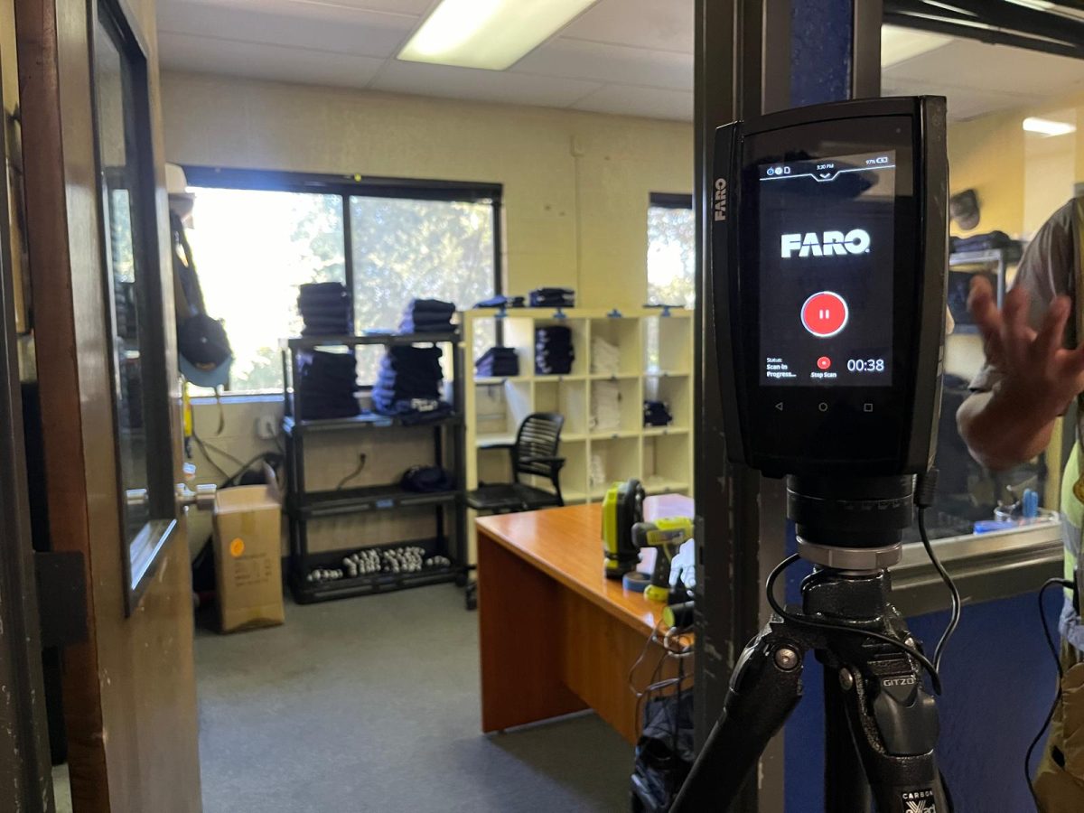 The Faro laser scanner is set up in the locker room of the gym as Webb students received a demonstration of how the scanner works. This scanning marks the first phase of the gym’s renovation. "I think there should be student voices involved [in the renovation] because although faculty see the gym, they don’t play on the gym floor as much as an athlete might,” Makayla Kays (‘28) said.