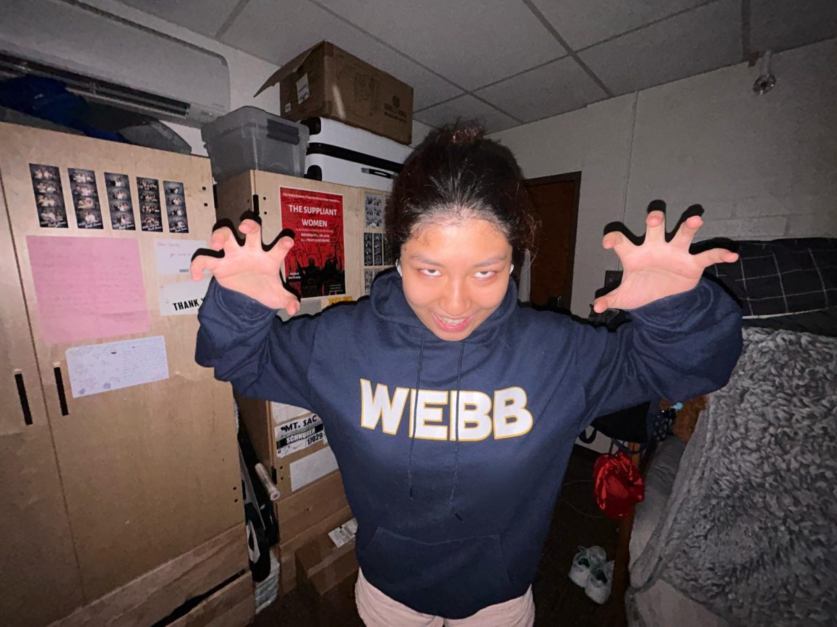 On December 12, 2024, at the Webb Schools' Jones dormitory, Sandy Li ('27) brought spooky vibes to campus. Sandy channeled her love for scary movies with a playful, eerie pose, evoking classic horror-inspired energy. "I really like scary movies because I love that rush of adrenaline when something jumps out at me," she said. 