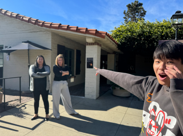 Jonathan Lee ('27) points at Sarah Lantz, Dean of Students, and  Yeslea Tadeo, Dean of Residential life, standing in front of the Deans' Building in fear as, highlighting the persistent stigma surrounding the space. "It doesn’t matter who she’s (Ms. Lopez) there for —when Ms. Lopez walks in, the whole room goes silent, and everyone gets tense," Jonathan Lee ('27) said. This reaction reflects how the Deans' Building's intimidating reputation often impacts students, even in situations where no disciplinary action is involved. 