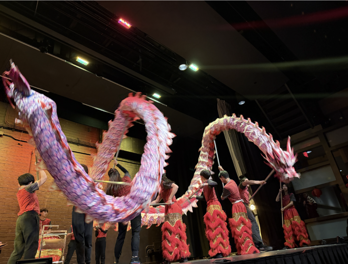 As the drumbeats, mystical creatures of blue and red scales entered. This mysterious creature is the dragon and lion for the lion dance performance.  These traditions, fortunately, bring a sense of home to international students. “Watching the lion dance reminds me of performances I watched at home in Shanghai,” said Jessica Lu (‘27).  