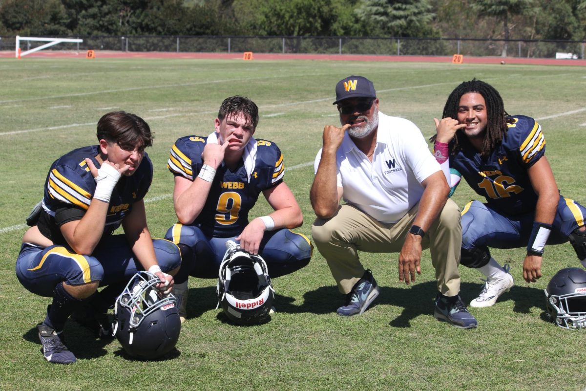 After an impressive 64 to zero defeat against Workman High School, Stratton Rebish (‘24), Troy Seanoa (‘24), and Ale Fountain (‘24) pose for a picture with Michael Dunford. “It was a nice win coming off back-to-back losing seasons, and it had a lot to do with Dunford and his coaching, inspiring us to believe which helped us keep winning,” Troy said. Under the leadership of Coach Dunford, the Gauls defense continued to have a stellar season, helping propel the team to a 12-1 record and playoffs for the first time in 4 years.  