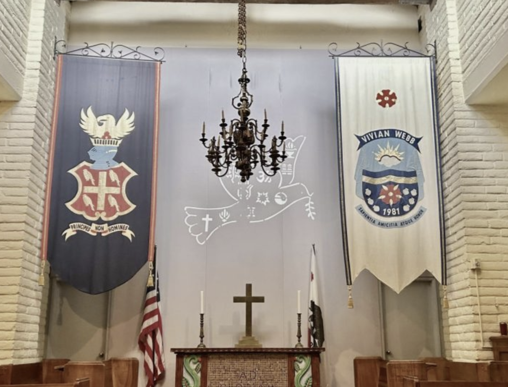 Flags of Vivian Webb school and Webb school of California hanging the front of Vivian Webb Chapel. During Sunday Chapel, speakers deliver talks on the podium and students sit in the back pews. “I really enjoyed the talk of the speakers every day, and I feel like I always gain new insights.” Jerry Hu (‘26) said.  