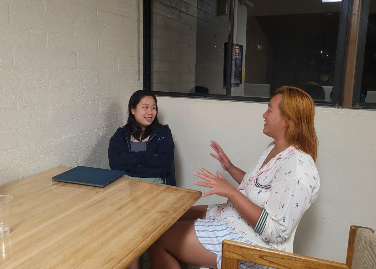 Claire Yu (‘27) and Grace Zhu (‘25) have a funny and serious conversation as they sit together in the Jones upstairs common room area. Grace shares some of her most crucial tips that got her through junior year as Claire begins to prepare herself for her first upperclassman year. “It's nice to have a friend like Grace who has experienced things that I haven't experienced yet so that I have an idea of what I'll be doing soon.” Claire said. “Talking with Grace about her experience has taught me that every student has their own unique journey, but we can also get good advice from our senior friends.” 